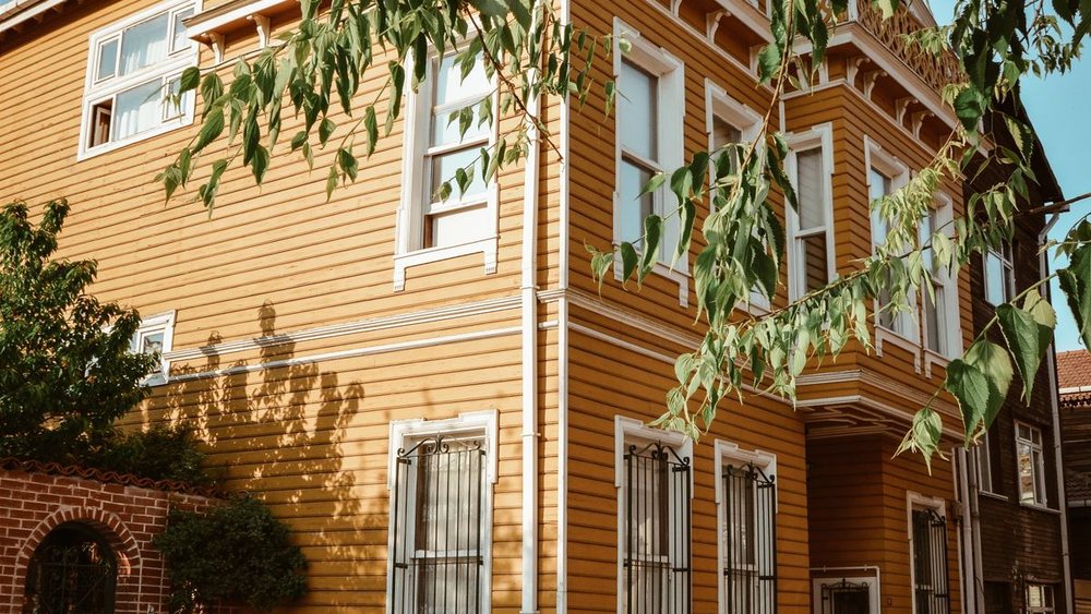 A timber-clad house front after the facade work