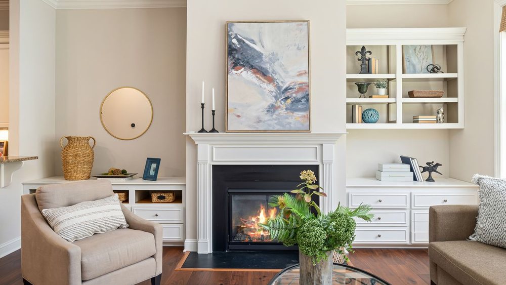 A living room with the fireplace rebuilt as the focal wall