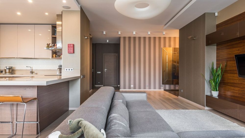 An open-plan living and kitchen space in a rear addition