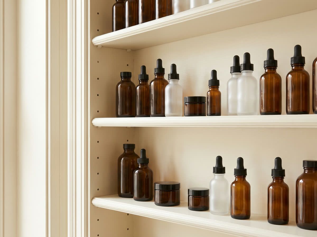 Cream shelves of skincare in a soft-lit studio